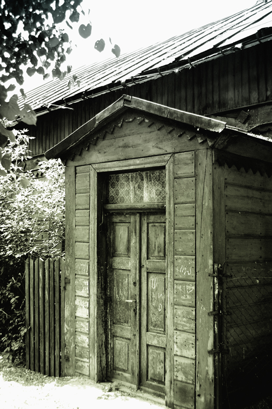 Fragment drewnianego domu przy ul. Płockiej